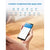 A person holding up a Renpho Solar Power Bluetooth Weight Scale with the words 'body composition analysis'.