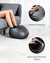 A woman is sitting on a couch, enjoying a relaxing foot massage from a Renpho Shiatsu Foot Massager Premium.