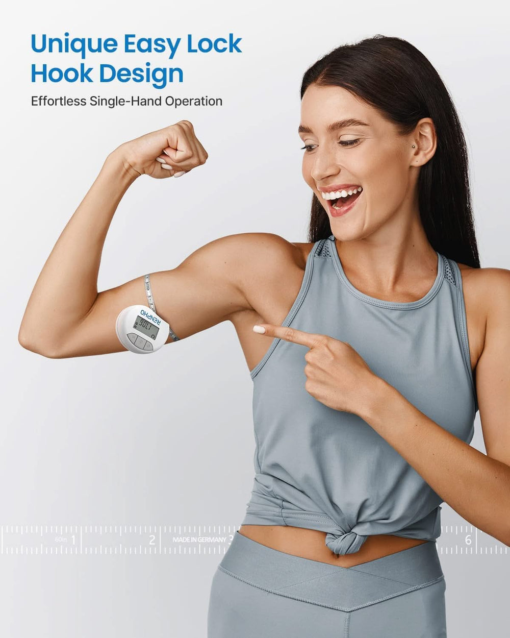 A woman in a gray athletic outfit smiles and points at her bicep, flexing to display a white digital tally counter attached to her arm. The text reads, "Unique Easy Lock Hook Design - Effortless Single-Hand Operation." She stands against a plain, white background, highlighting the precision of the Renpho Smart Tape Measure BMF01 for body measurements.