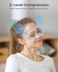 A woman with brown hair tied back is seated and wearing a white long-sleeved shirt. She has her eyes closed and is smiling while using the RENPHO US Eyeris 1 Eye Massager, which is light blue and has a Bluetooth feature. Illustrations show hands applying gentle pressure to the mask, stating, "2-Level Compression: Relax Deep Muscles, Temples, and Eye Areas." A blurred wooden furniture piece is in the background.