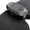 A black and white image of the Renpho EyeSnooze Aroma device that is connected to the back of a person's head.(A)