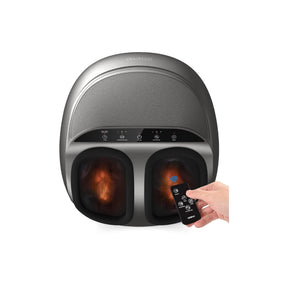 A modern Renpho Shiatsu Foot Massager Premium in a metallic gray color, featuring glowing red heat elements and deep kneading massage capabilities. A hand holding a remote control adjusts the settings, visible in the foreground against.(A)