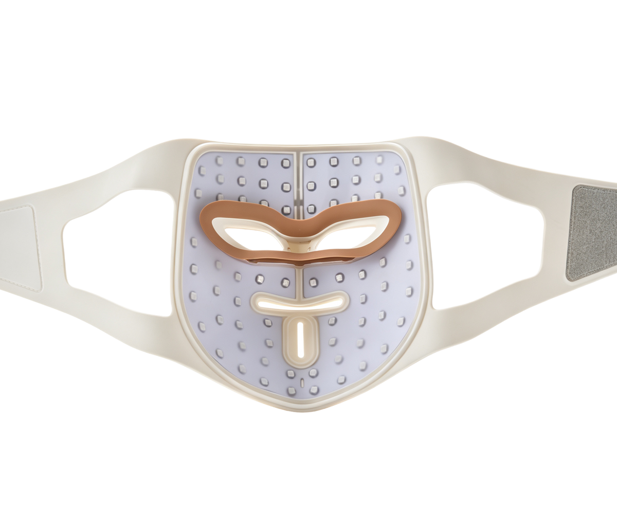 Inside of the RENPHO ARTEMIS II Aër LED mask with lights off, showing the LED grid, padded eye shield and straps