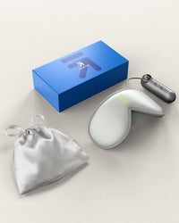 A Renpho box with an EyeSnooze Sleep Mask and a wellness pouch.